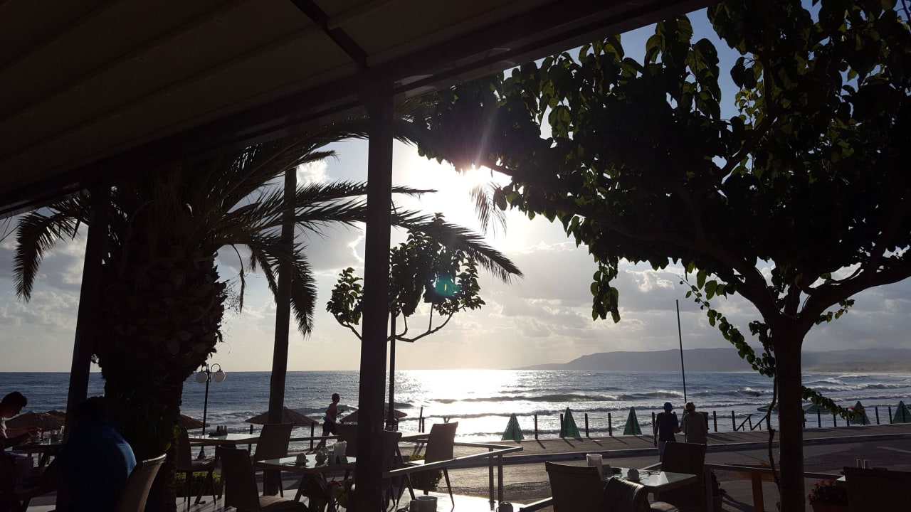 Reustaurant und strand Harmony Boutique Resort