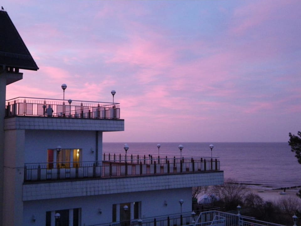 Blick vom Balkon bei Sonnenuntergang Hotel am Fischerstrand