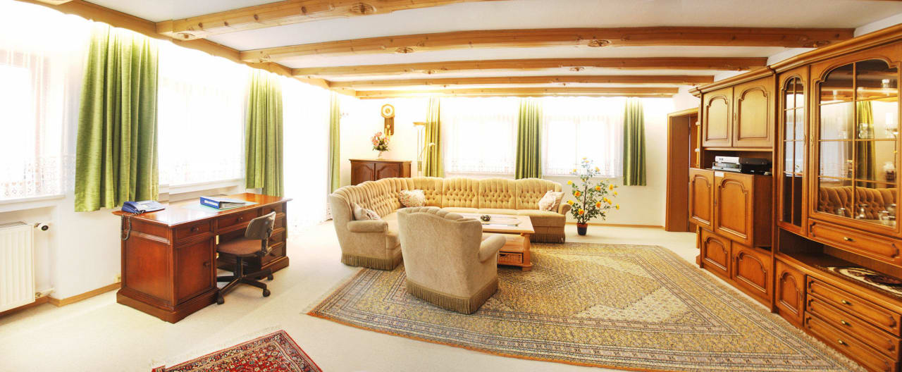 Wohnzimmer Erdgeschosswohnung Ferienwohnungen Zentral