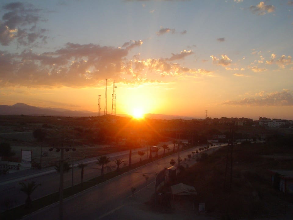 Sonnenaufgang aus dem Zimmer Seaden Corolla Hotel