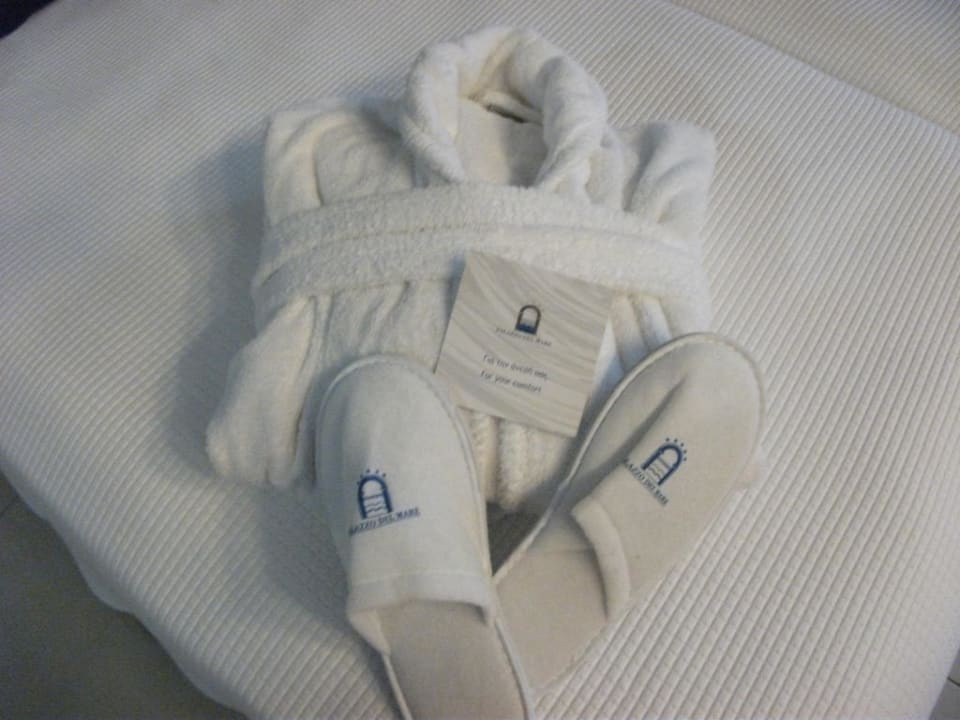 Bademantel und Schlappen TUI BLUE Palazzo del Mare