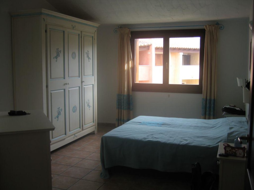 Schlafzimmer Le Corti Di Marinella Hotel Le Corti Di Marinella