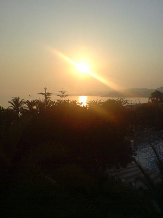 Sonnenuntergang vom Balkon aus Top Hotel
