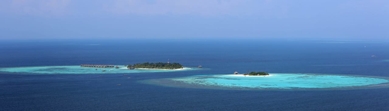 Maafushivaru aus der Luft Outrigger Maldives Maafushivaru Resort