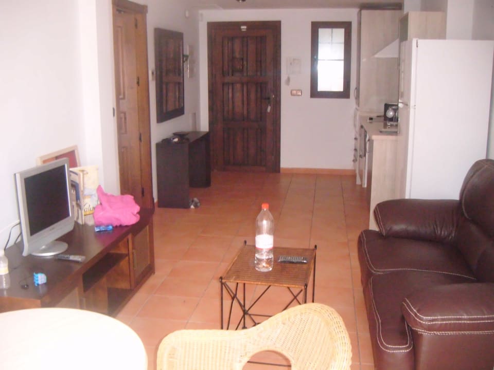 Cocina y salón Apartments La Santa Cruz