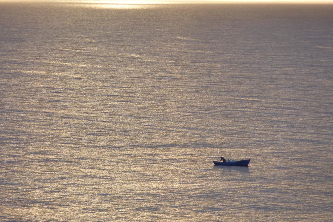 Fischerboot bei Sonnenaufgang Hotel Riu Palace Tres Islas