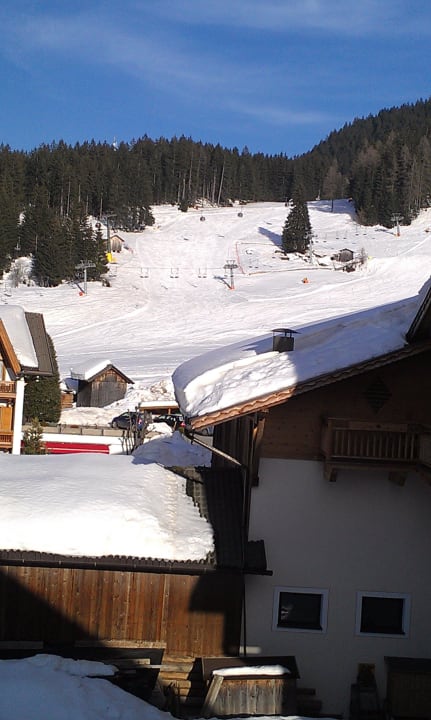 Schöne, breite Skiepisten Post Alpina - Family Mountain Chalets