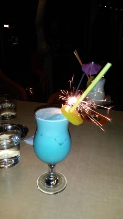 Cocktail mit Glitzereffekt Harmony Boutique Resort