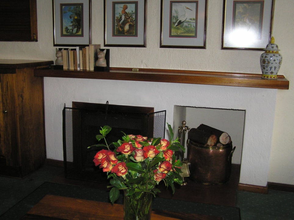 Kaminwand im Zimmer Hotel Coach House