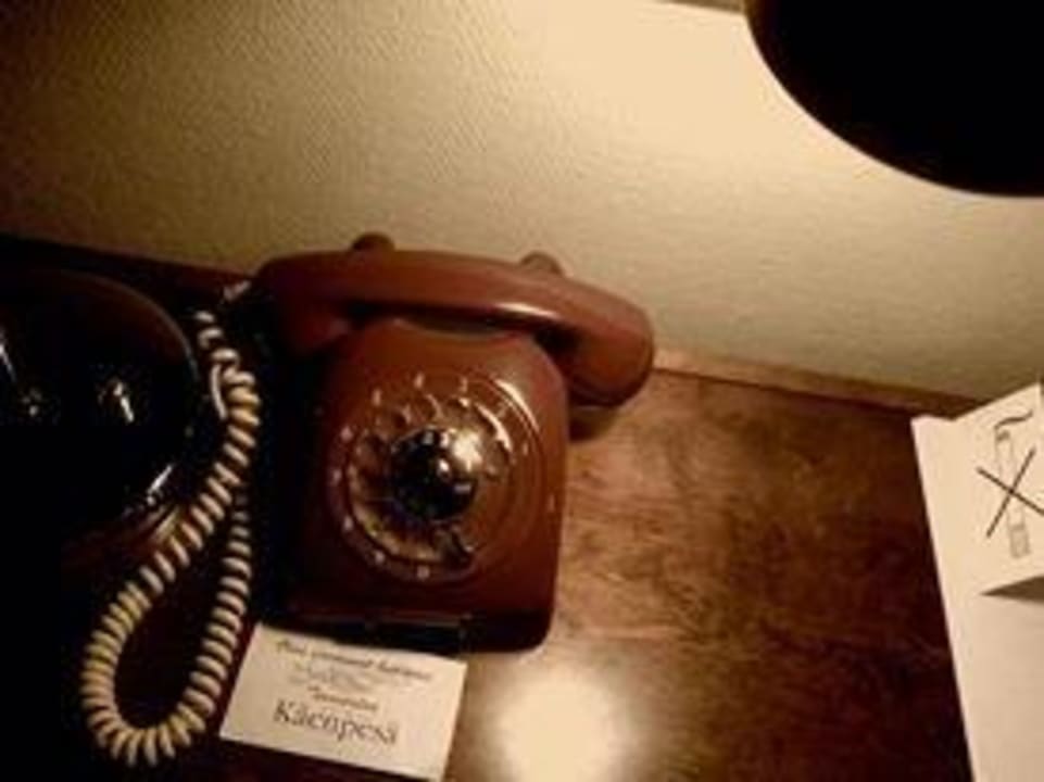 70's style land phone. And still working. Hotel Kaenpesae