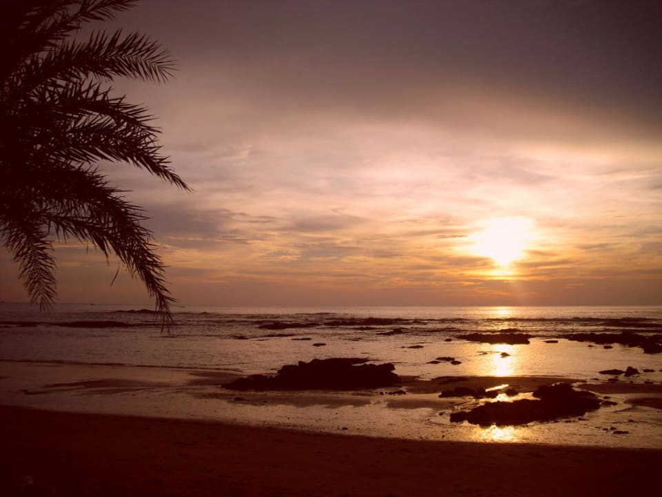 Sonnenuntergang Ocean Breeze Resort