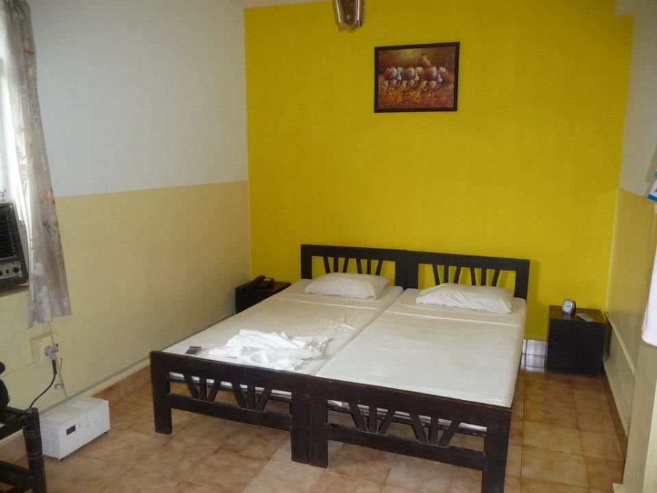 Bett im Schlafzimmer Hotel Don Joao Resort