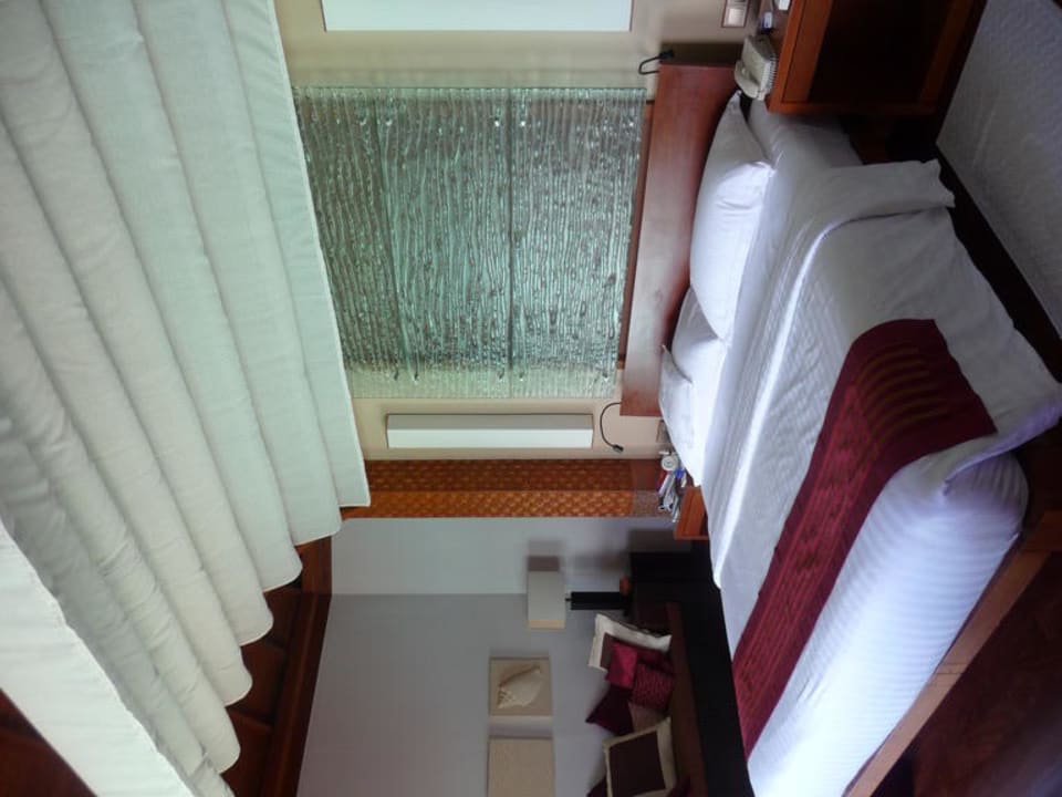 Das gemütliche Bett Baros Maldives Resort