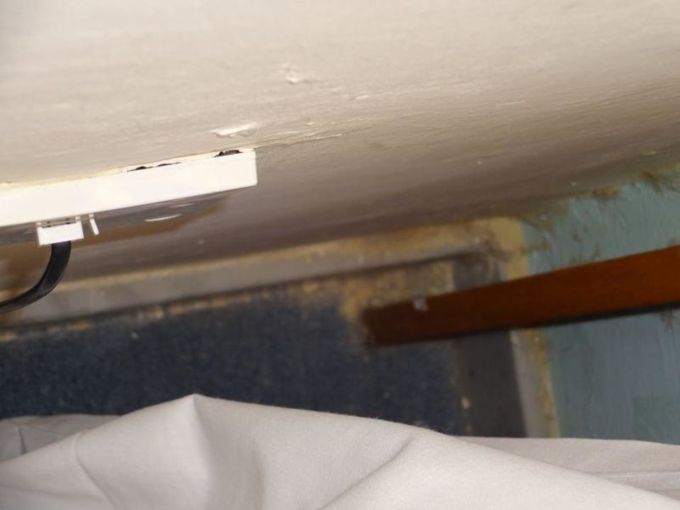 Hinter dem Bett Hotel Santana