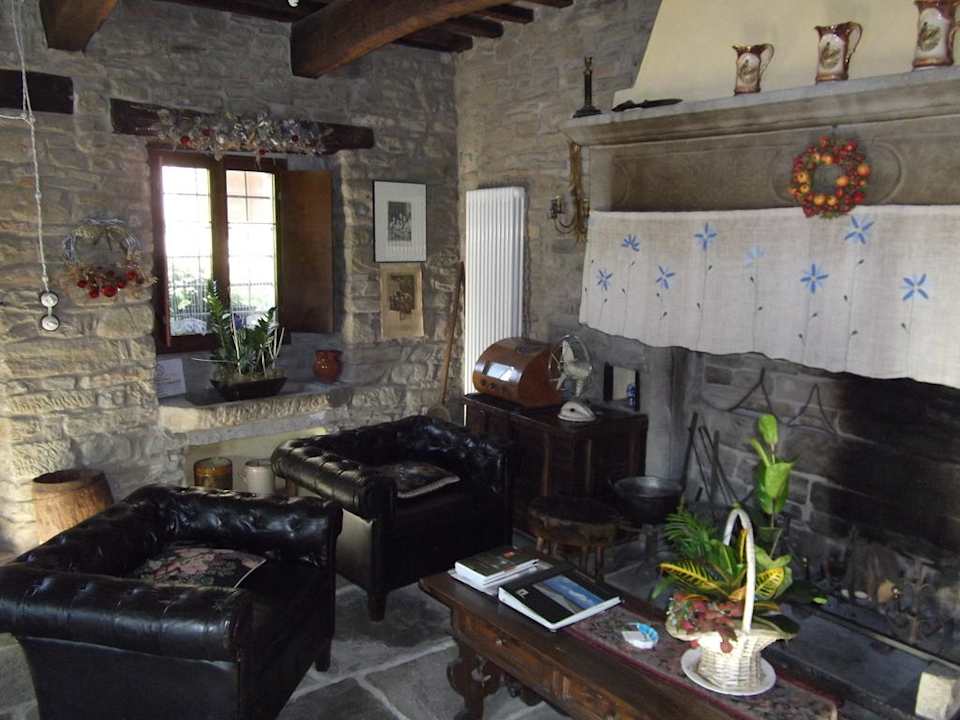 Antikes im Gemeinschaftraum Agriturismo Relais Castello Della Pieve