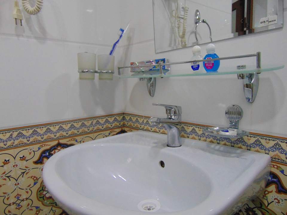 Zimmer Madrasah Polvon-Qori Boutique