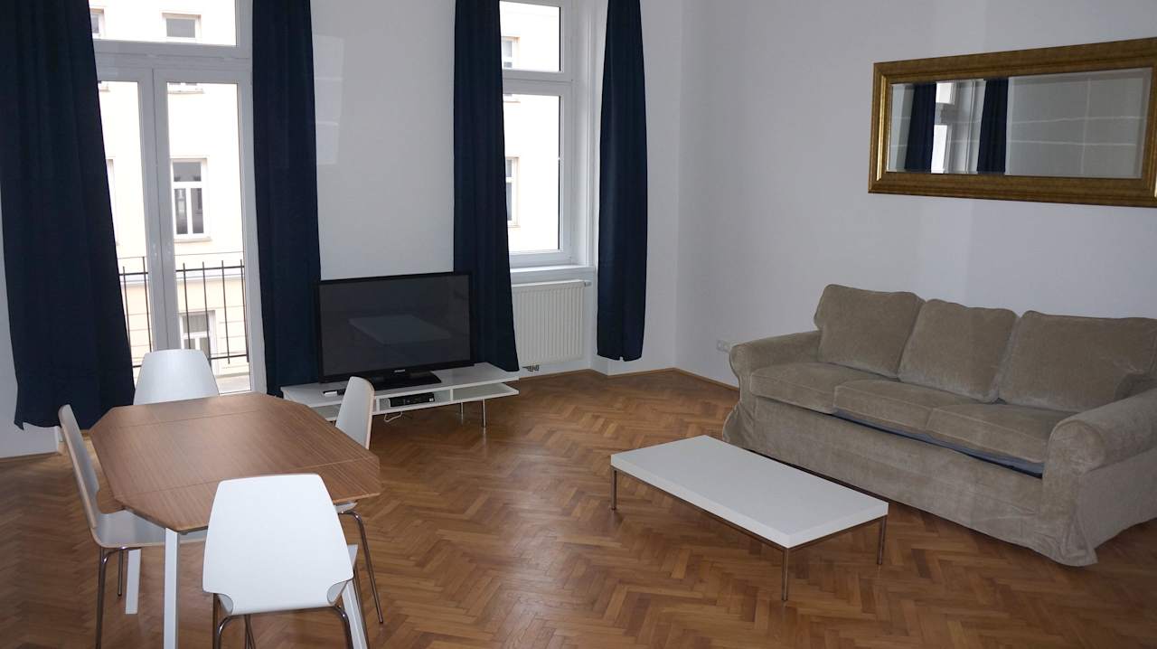 Wohnzimmer im Deluxe Apartment mit 1 Schlafzimmer City Apartments 1080