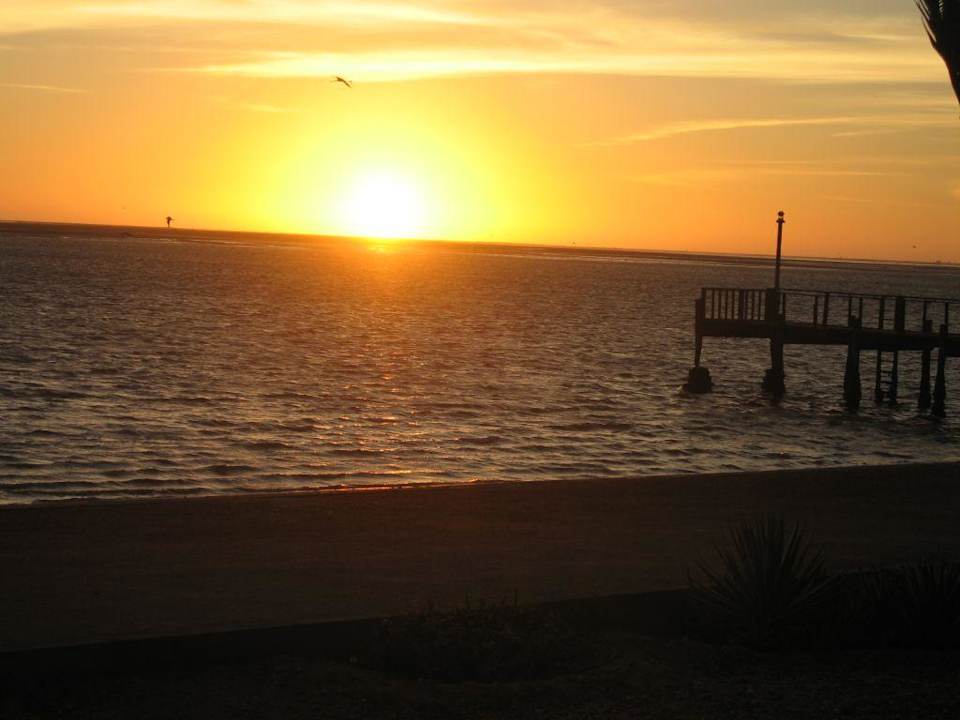 Sonnenuntergang direkt von der Terrasse Hotel Pelican Bay Protea