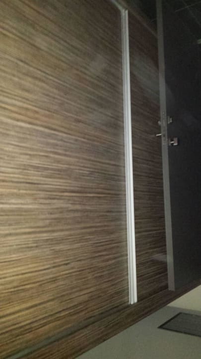 Duża szafa w niej mała lodówka NEMA Design Hotel & Spa (Adults Only)