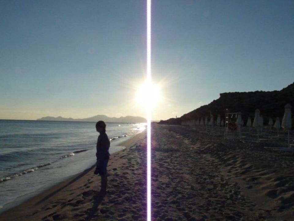 Sonnenuntergang am Meer Porto Bello Beach