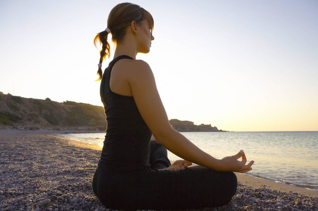 Yoga Lessons on the Beach Elysium Resort & Spa Hotel