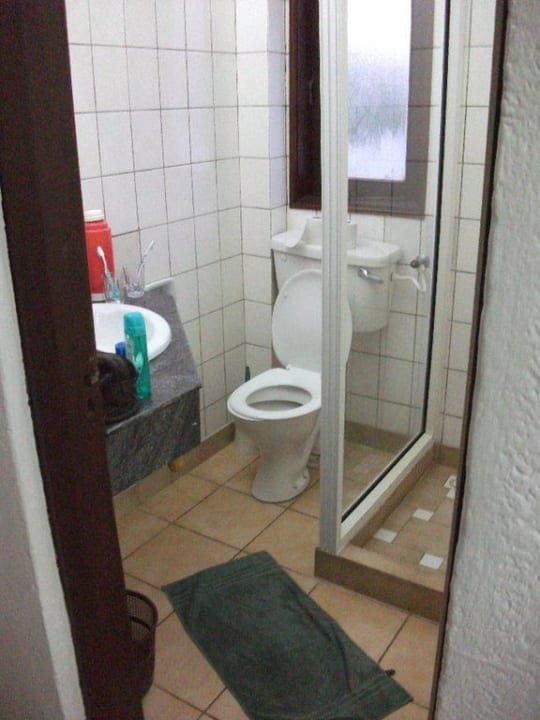 Das Badezimmer Neptune Village Beach Resort & Spa