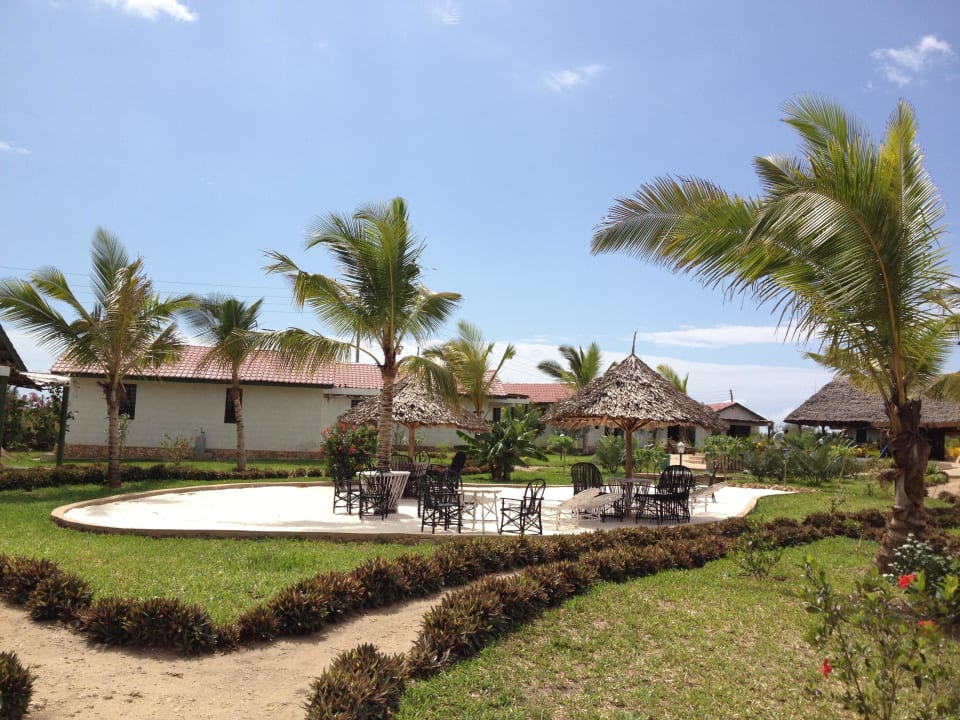 Garten mit Lounge African Dream Cottages