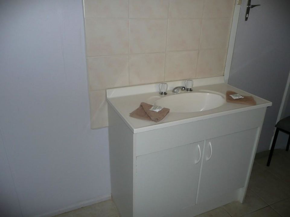 Waschbecken im Bad Anchorage Holiday Units