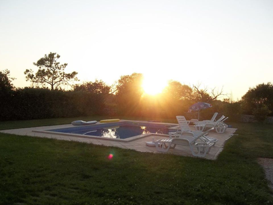 Pool bei Sonnenuntergang Haus Agricola
