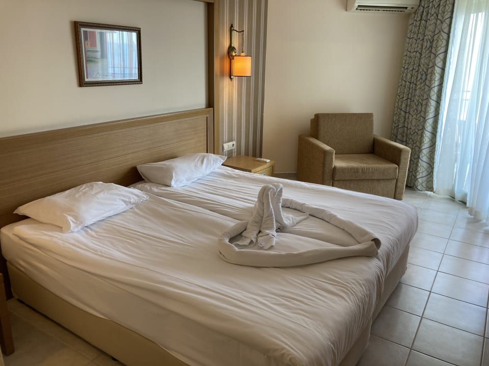 Zimmer Iz Flower Side Beach Hotel