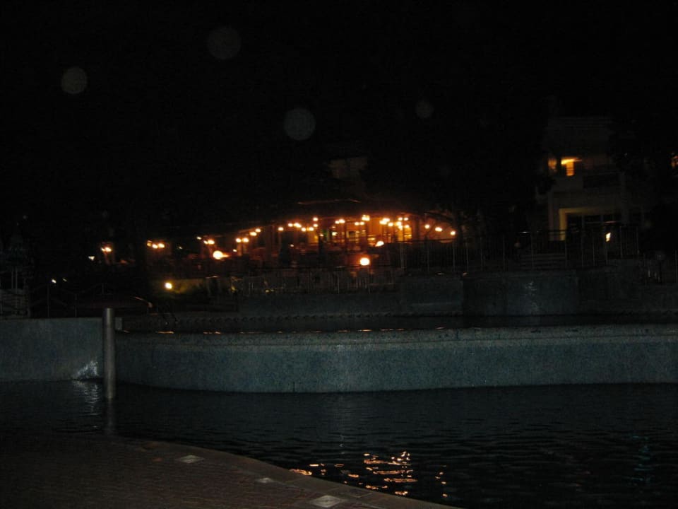 Around pool by night Hotel Orchidea Park