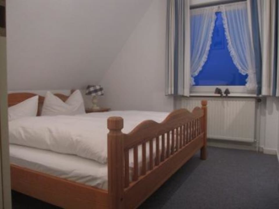 Schlafzimmer Apartmenthotel am Leuchtturm