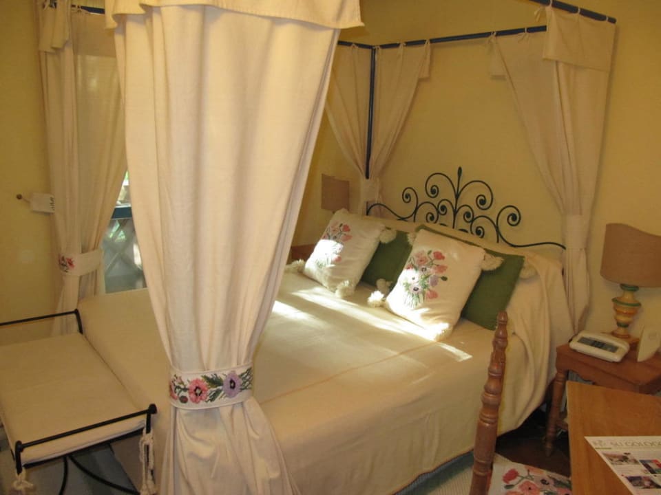 Il letto Su Gologone Experience Hotel