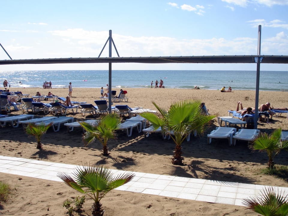 Strand Club Grand Side