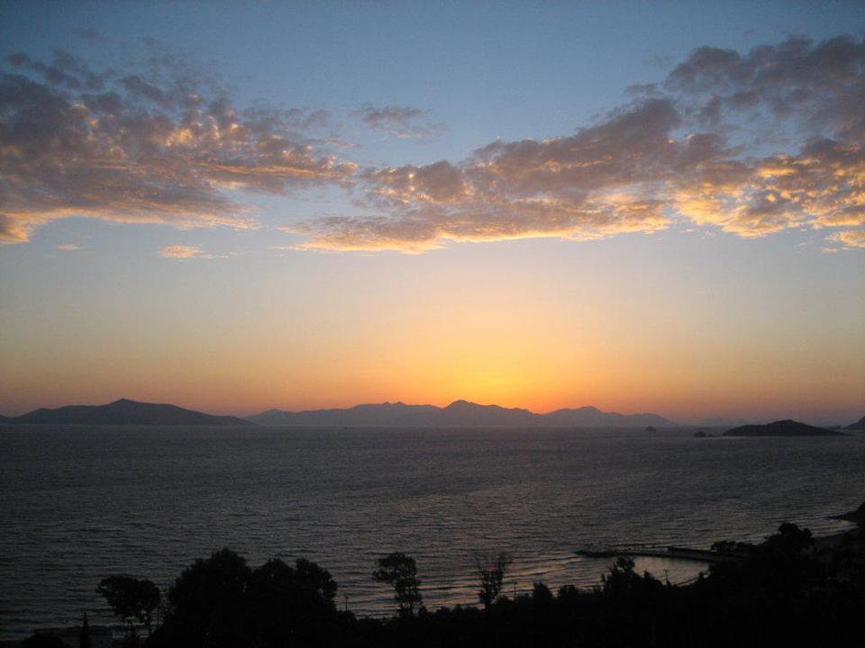 Widok z balkonu na zachód słońca Woxxie Hotel