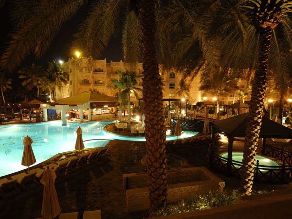 Pool by night Grand Hyatt Muscat