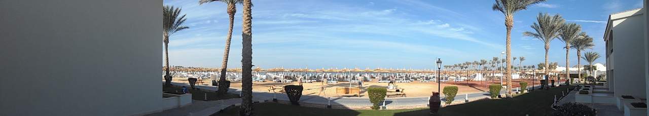 Вид на пляж с терассы Pickalbatros Dana Beach Resort - Hurghada