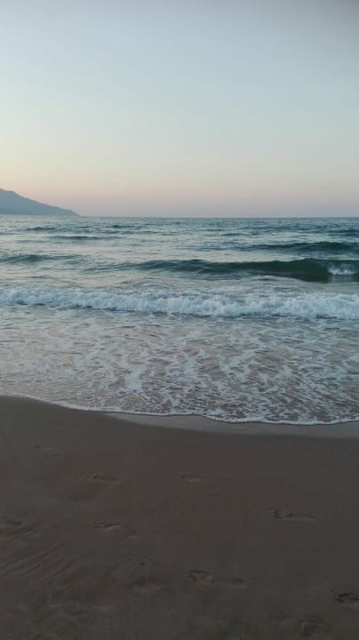 Meer HARPIN Happy Days Beach Hotel