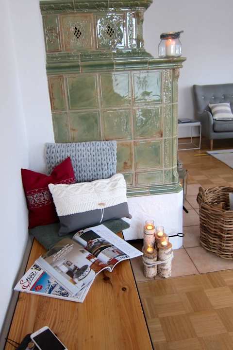 Gemütlich am Kamin sitzen  Ferienwohnung Alpspitzliebe