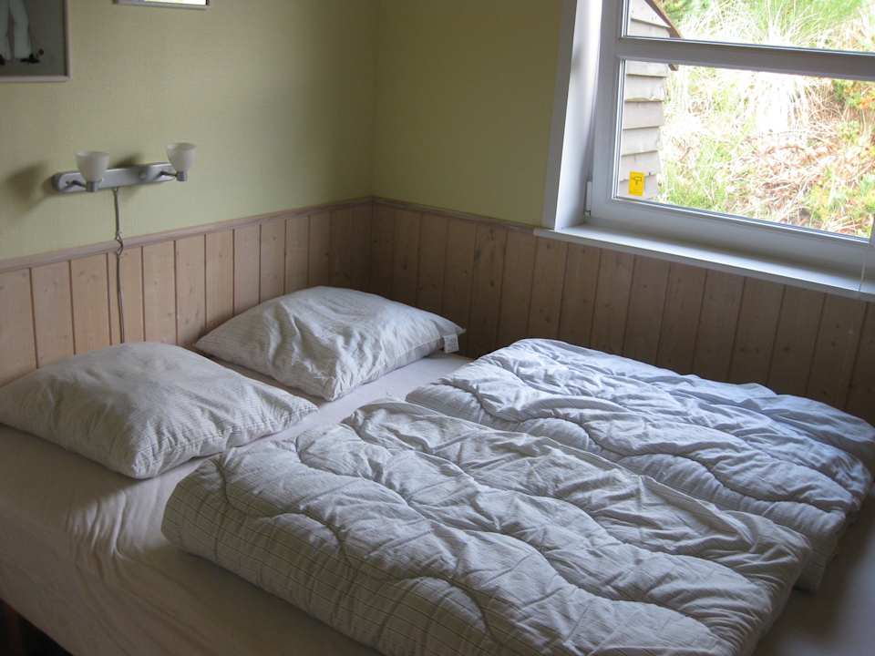 Eines der kleinen Schlafzimmer Klitmoeller Ferienhäuser Thisted