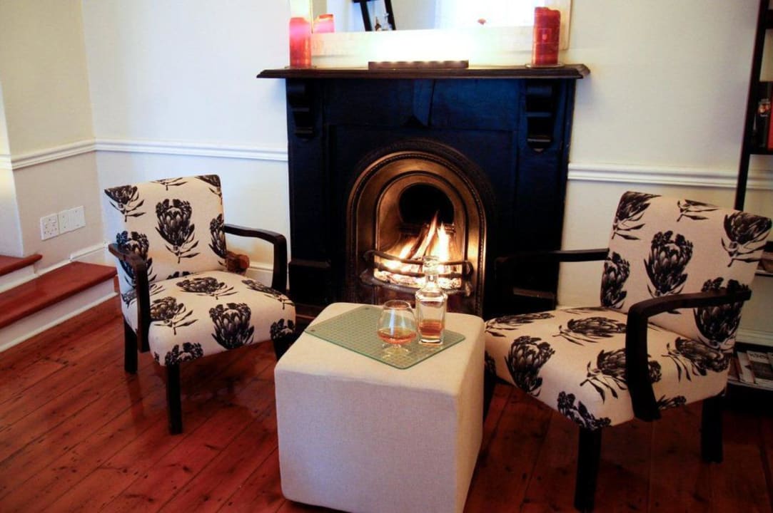 Brandy and Fireplace Nine Flowers Guest House