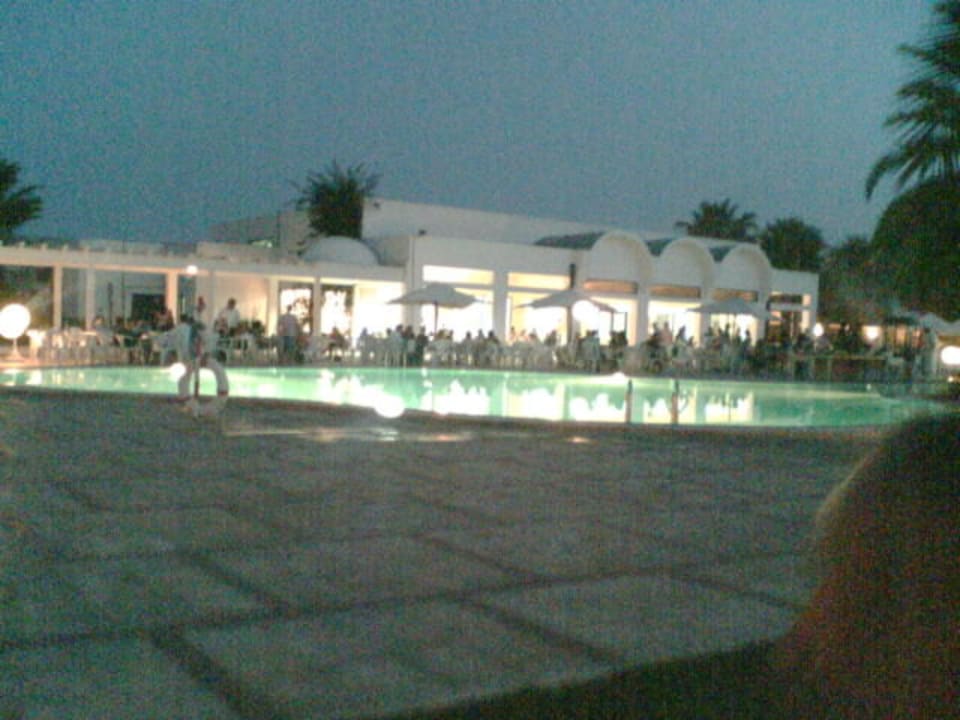 zweiter pool mit restaurant am abend Hotel Caribbean World Hammamet Village