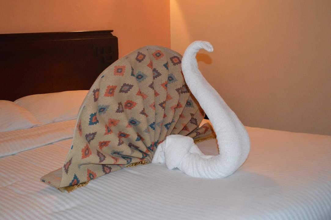 Фигурки на постели SUNRISE Holidays Resort (Adults Only)