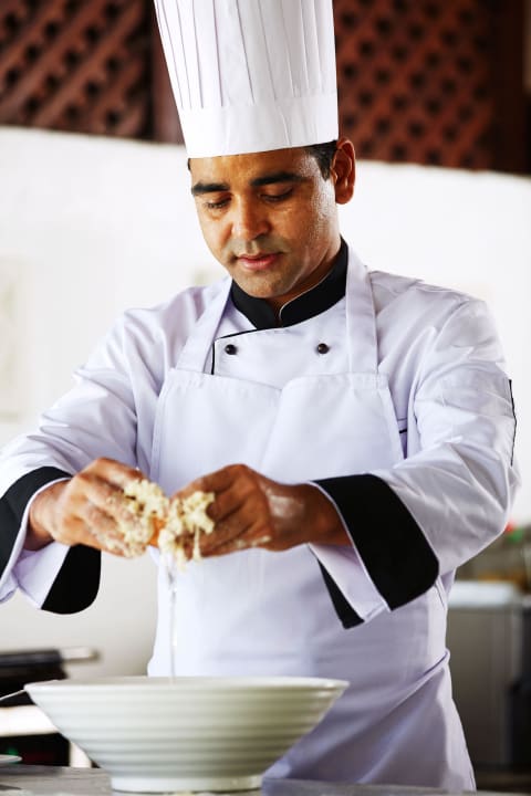 One of the chefs Neptune Village Beach Resort & Spa