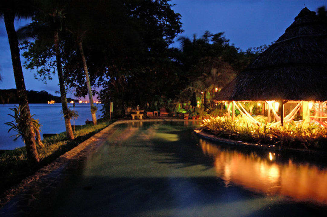 Pool at night Tortuga Lodge & Gardens