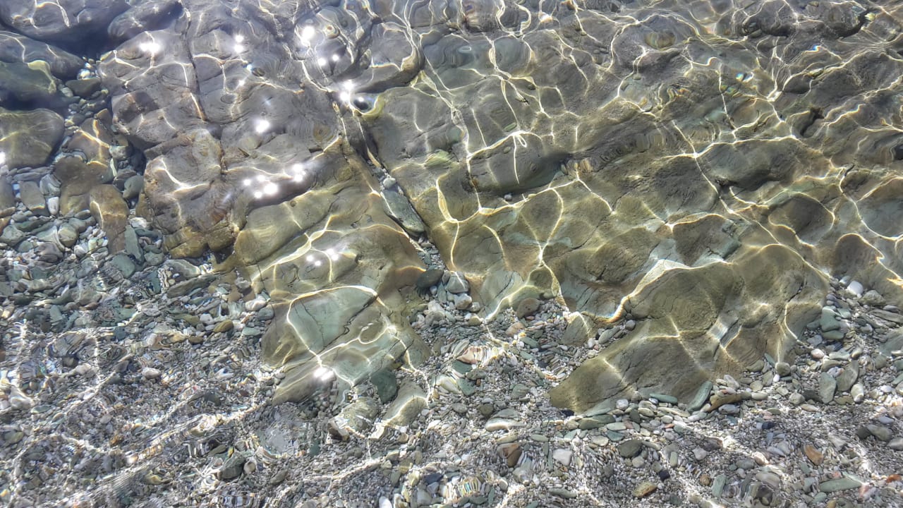 Klares Wasser am Strand Peninsula Resort & Spa