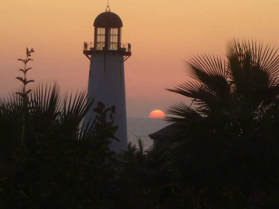 Sonnenuntergang mit Leutchtturm Hotel Riu Chiclana