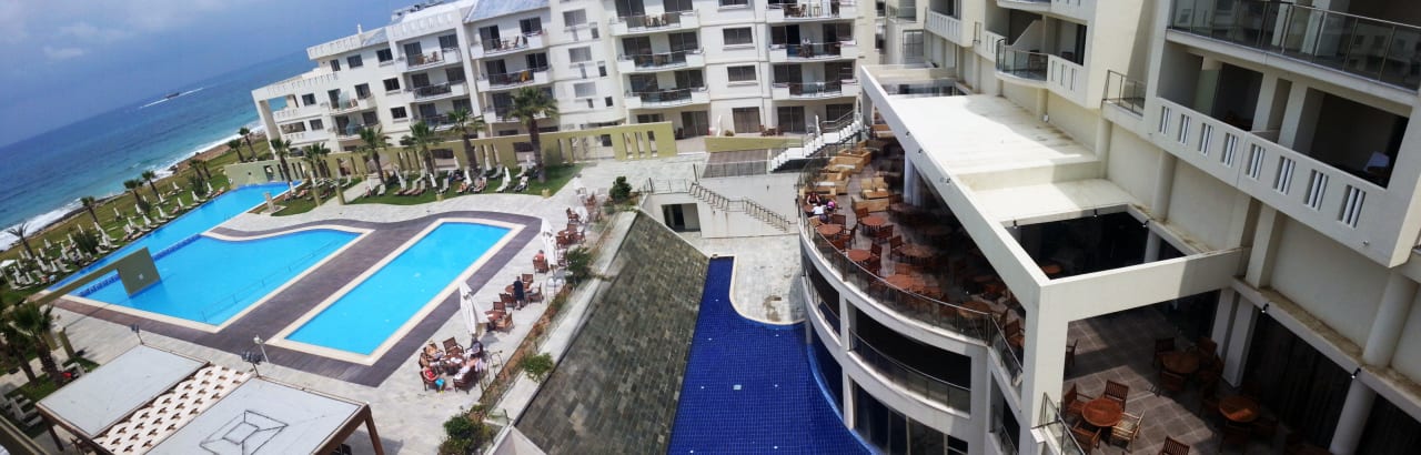 Day view from patio's balcony Hotel Capital Coast Resort & Spa