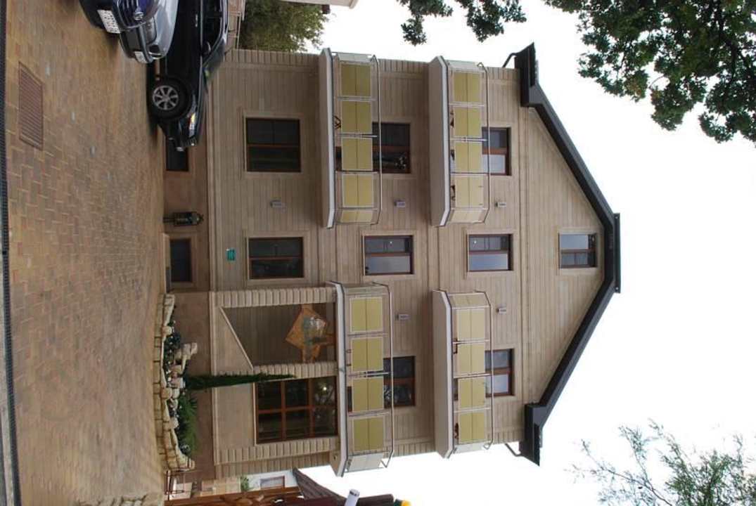 Фасад Casa Cypress / Гостевой дом Кипарис