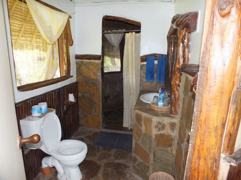 Das Badezimmer Lions Bluff Safari Camp